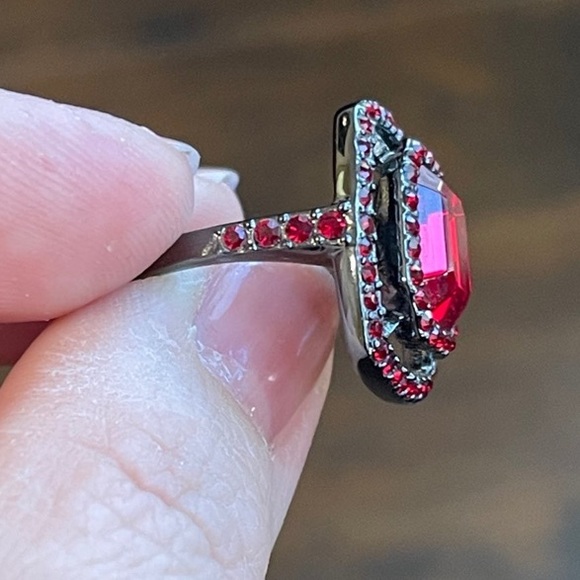 Givenchy Red Crystal
Ring in gunmetal setting. Size 6.75 - Picture 8 of 11